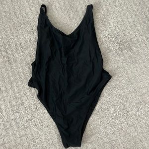 Black one piece with open back size large